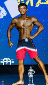 2023 INBF LA Natural Muscle Mayhem Open Men's Physique Overall Champion Andrew Lim WNBF Pro